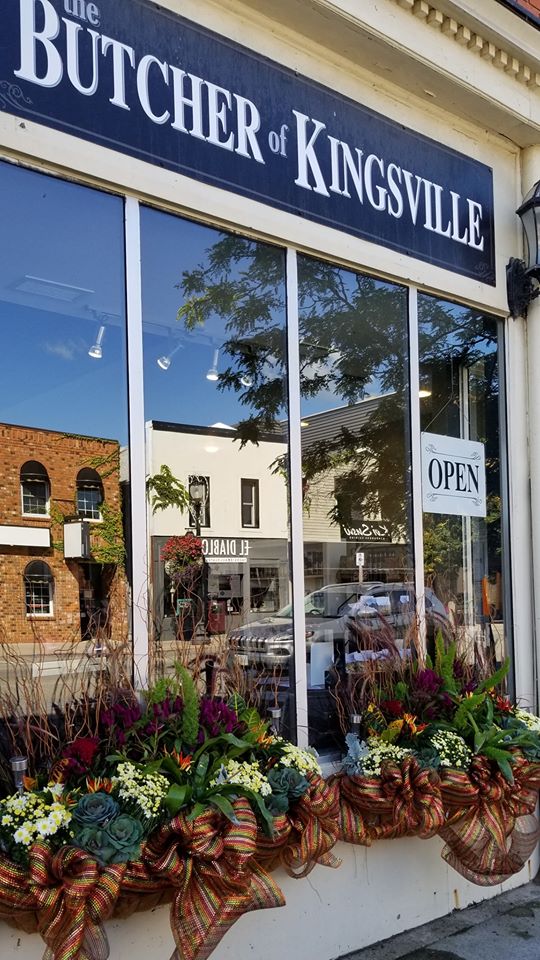 The Butcher of Kingsville at 13 Main Street West, Kingsville Ontario showing the outside entrance of the store. 