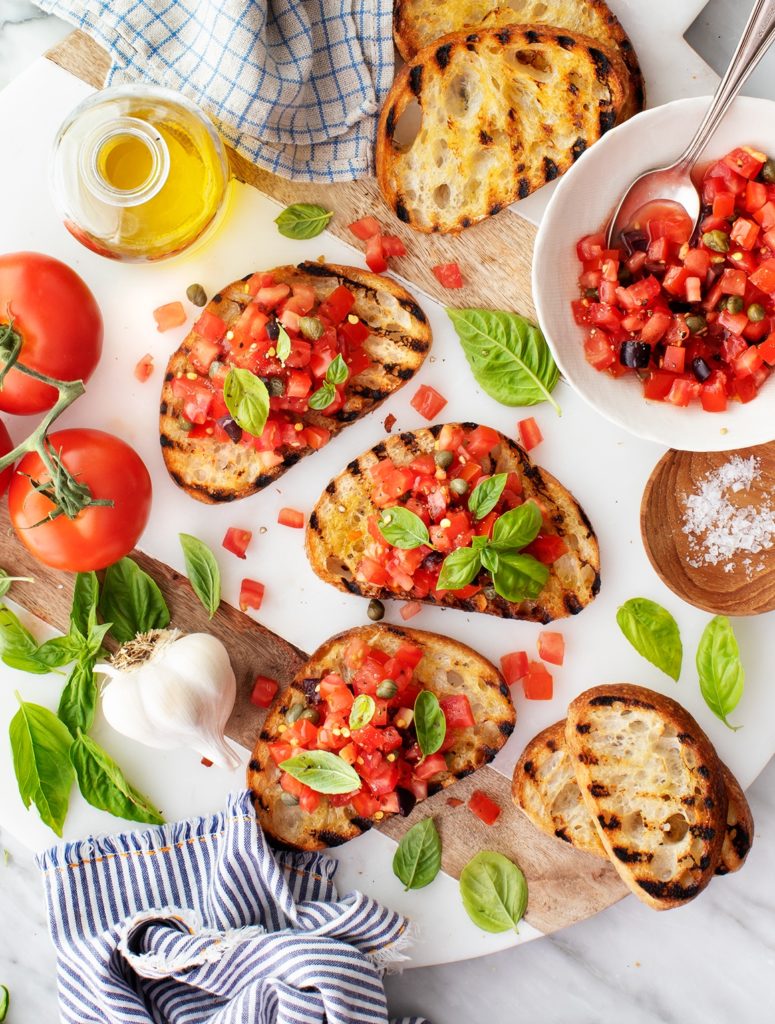 Plate of freshly made bruschetta. The perfect Farm Fresh Local Summer Sides
