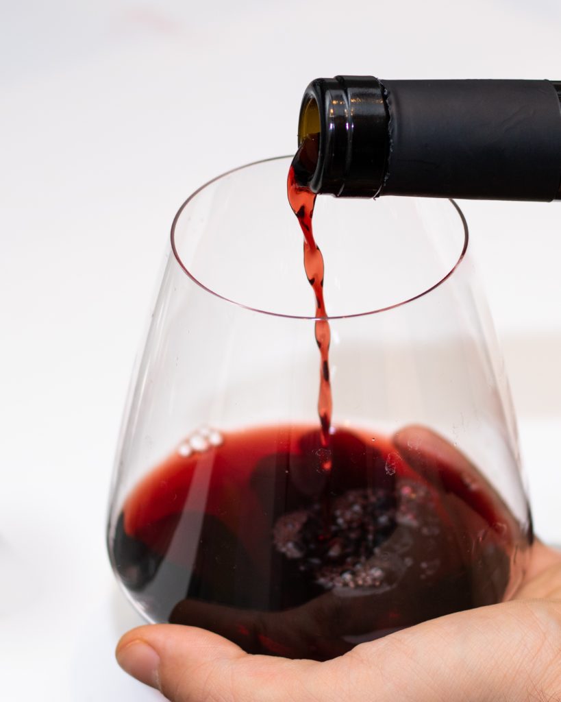 Cabernet Sauvignon being poured into a glass.