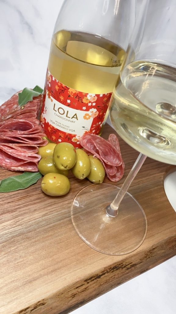 Board with wine LOLA Chardonnay VQA on ConVino charcuterie board with wine. 