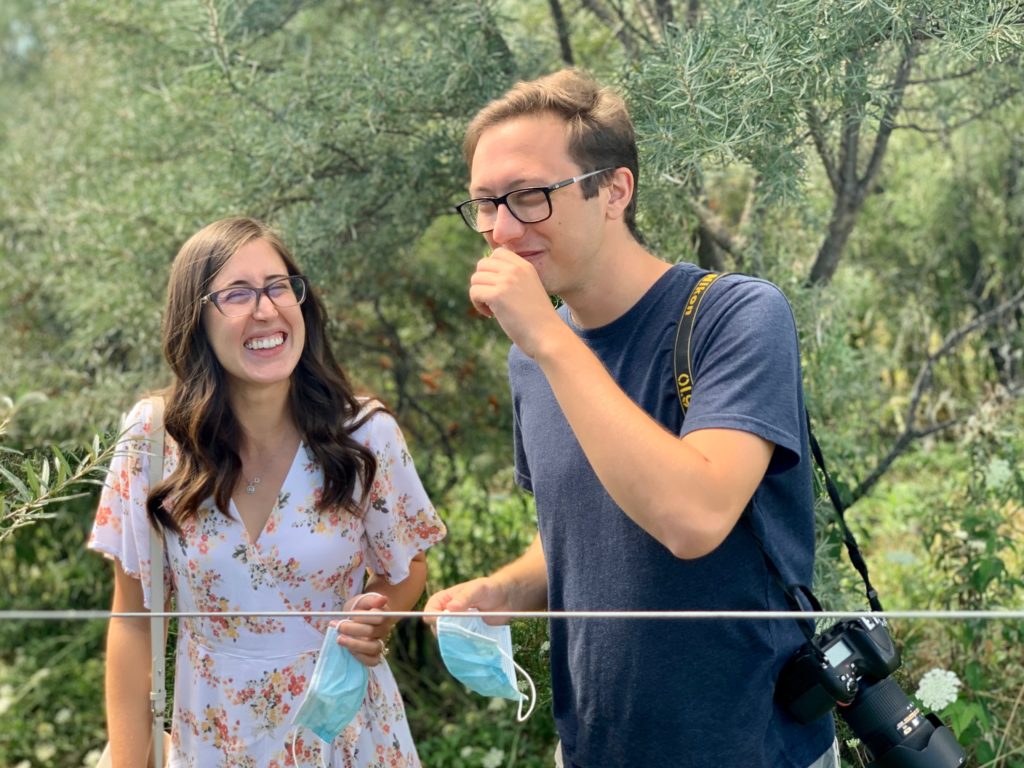 Ian Virtue with fiancé Katie, capturing staycation travel photography and tasting seabuckthorn berries in the vineyards of Pelee Island Winery on Pelee Island, Ontario.